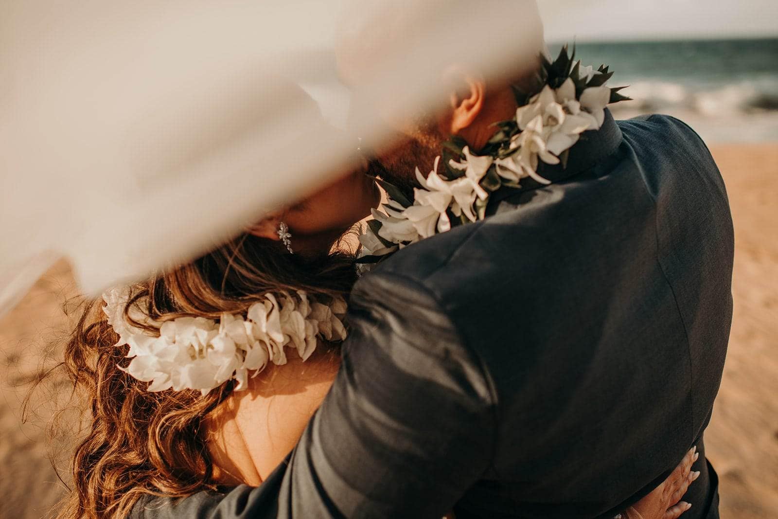 a romantic outdoor wedding day at DT Fleming Beach Park in Maui