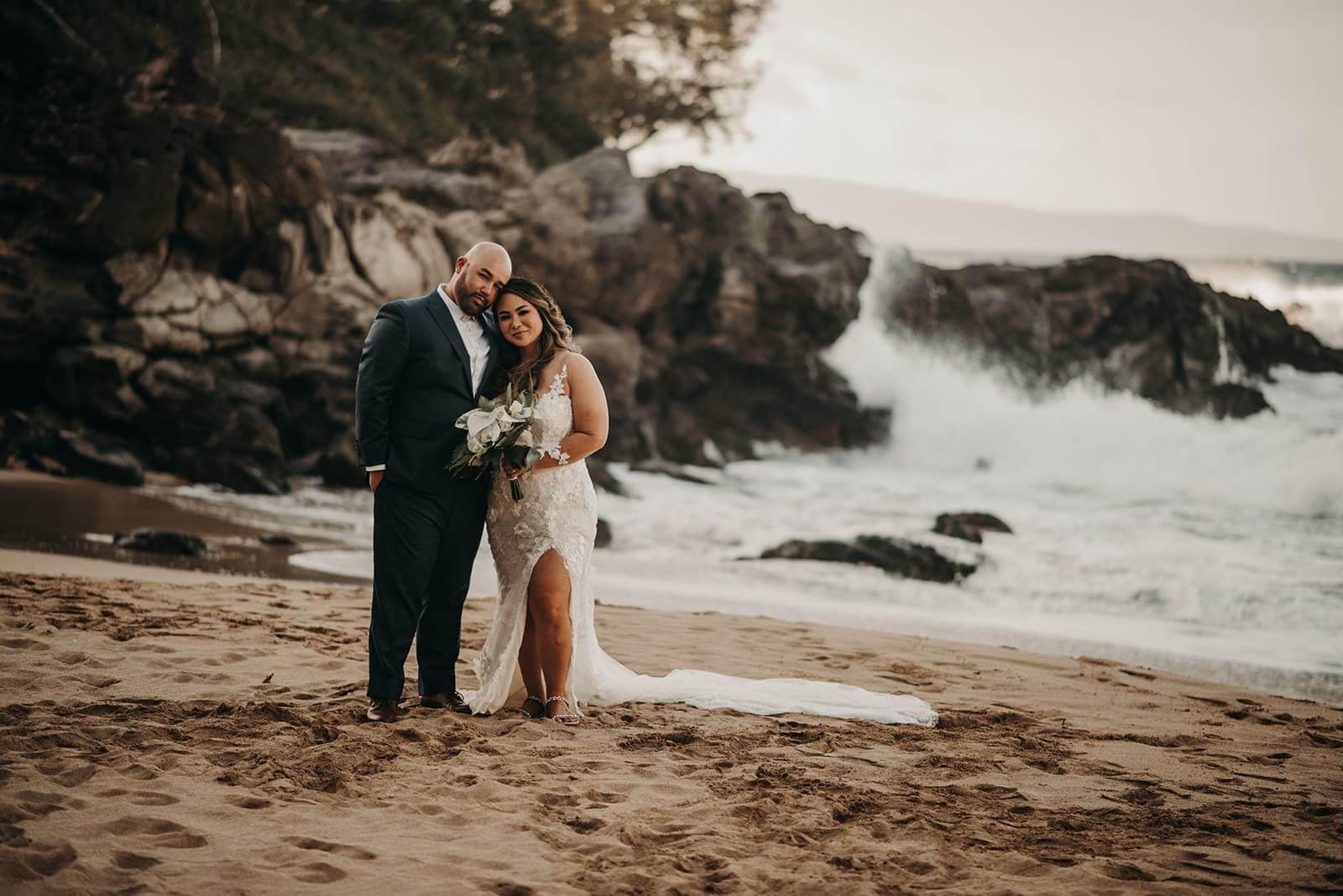 a romantic outdoor wedding day at DT Fleming Beach Park in Maui