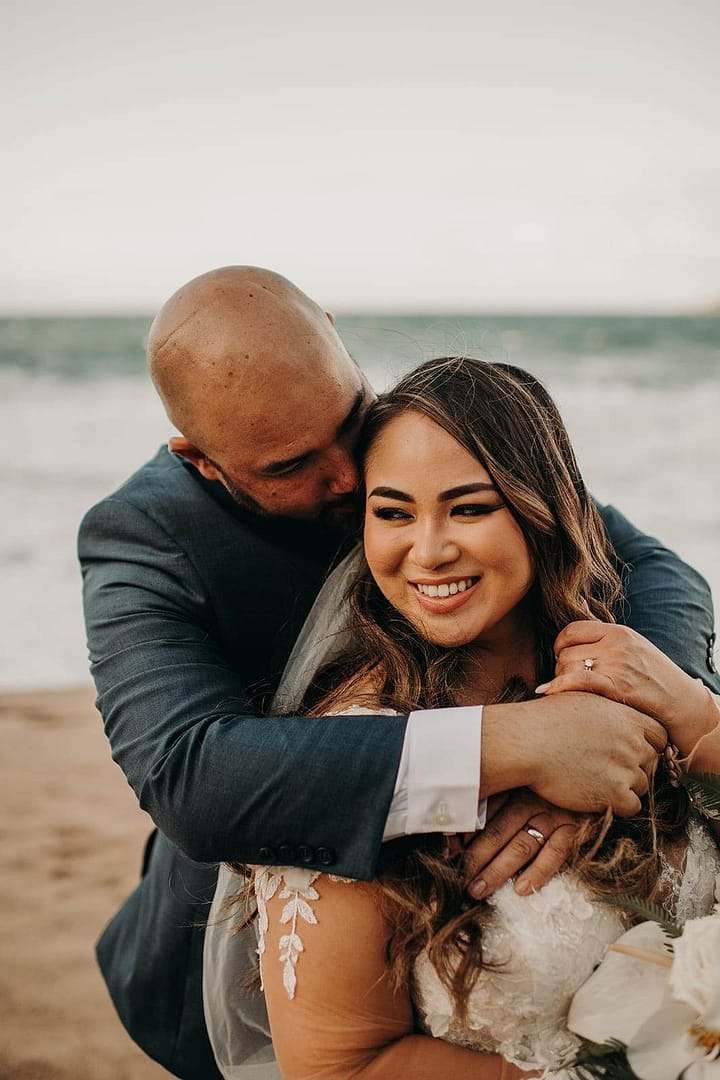 a romantic outdoor wedding day at DT Fleming Beach Park in Maui
