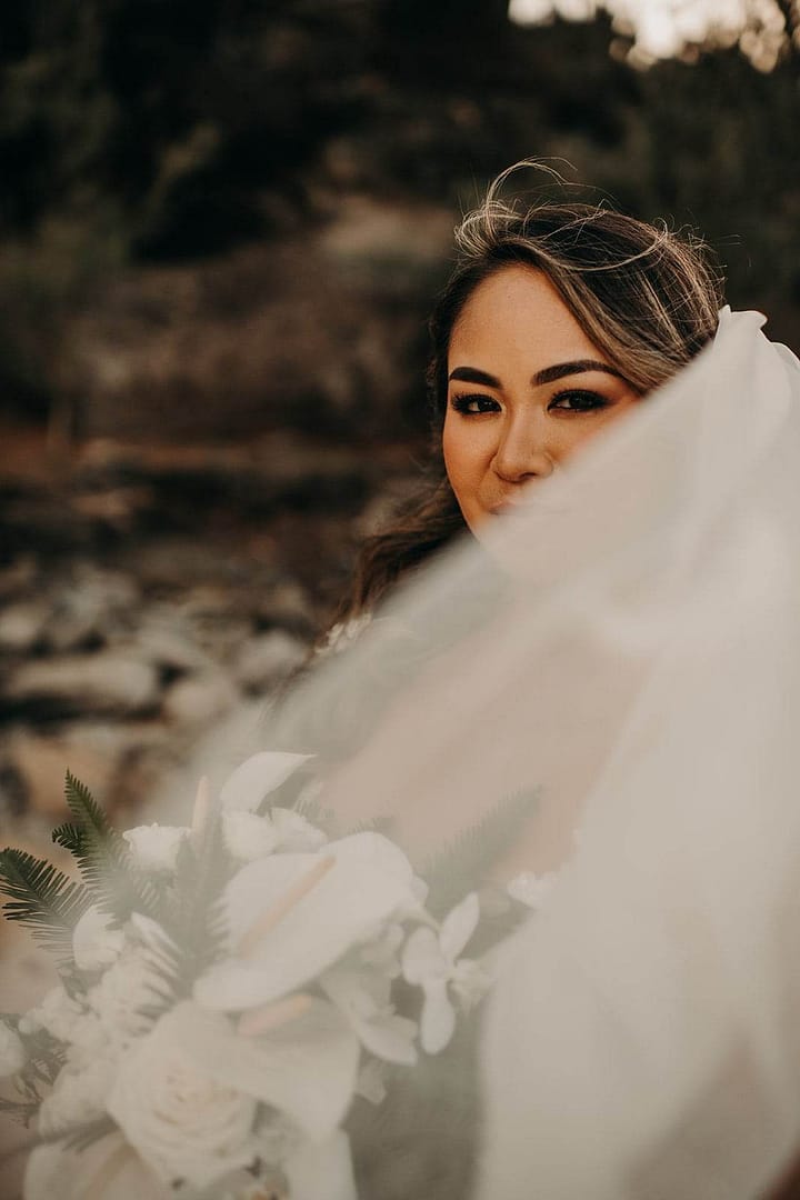 a romantic outdoor wedding day at DT Fleming Beach Park in Maui